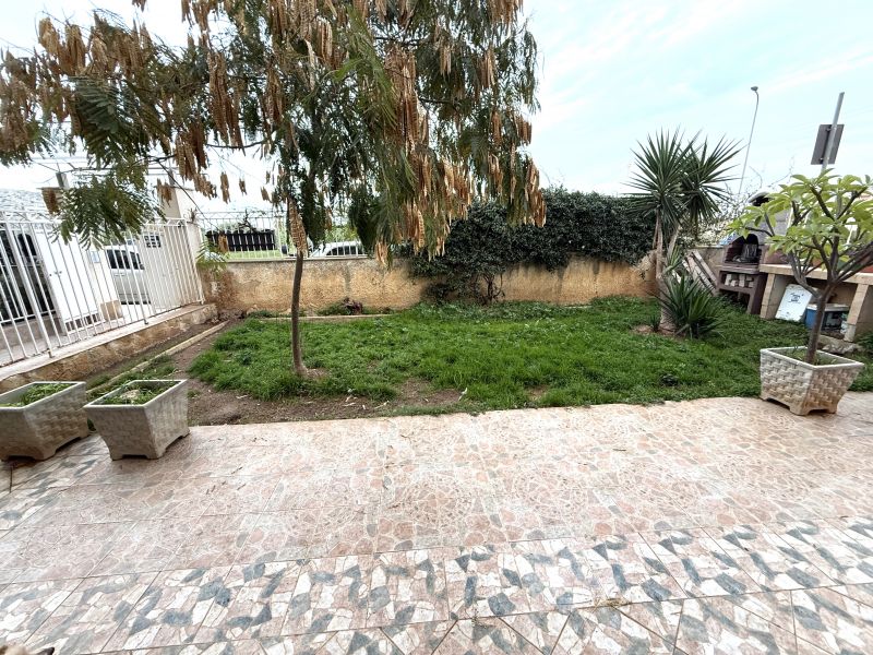 Appartamento piano terra con veranda/giardino e box auto